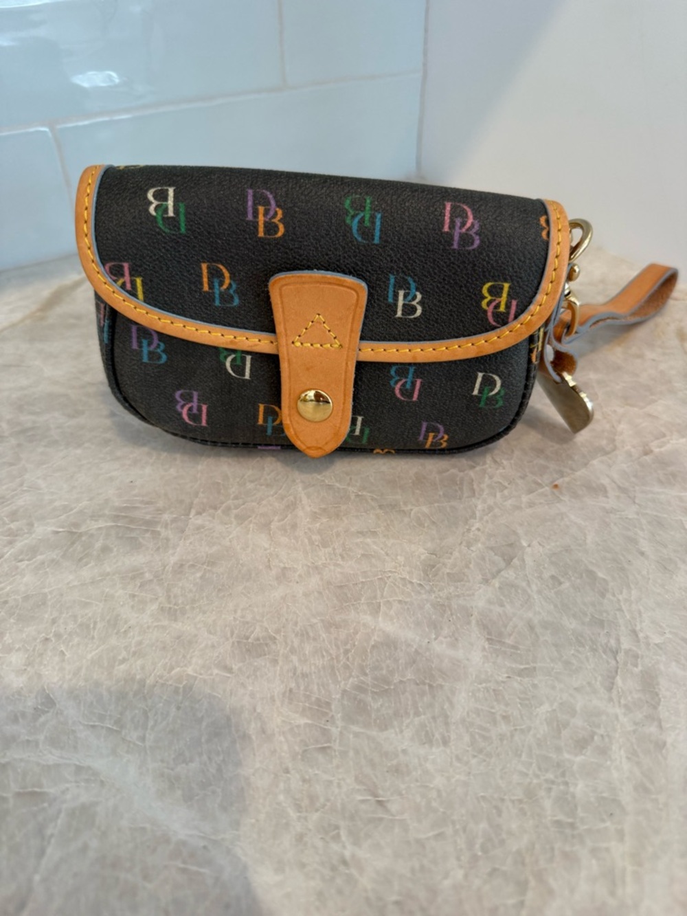 Dooney & Bourke Black Multicolor Logo Wristlet with Tan Trim